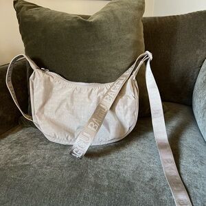BAGGU Small Nylon Crescent Bag in Beige